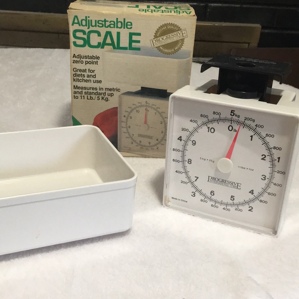 Progressive International Corp Adjustable Scale. Measures in metric and standard